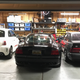 Blyth’s full, newly rebuilt garage at home with all three of his cars.